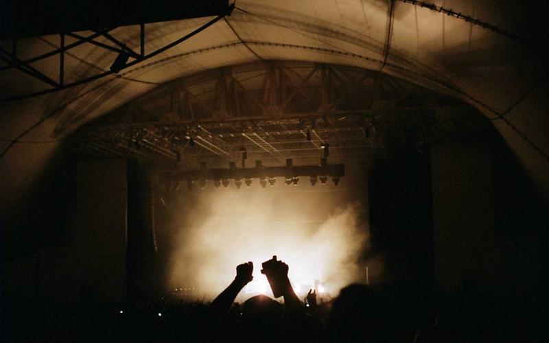 Person using smartphone to control a smart lock remotely